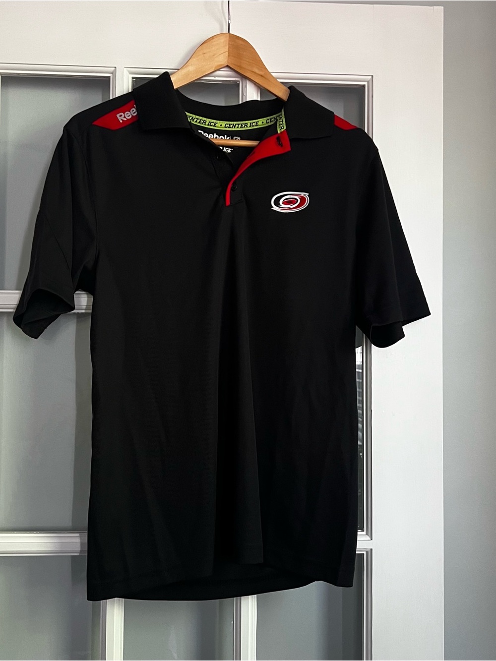 Reebok Black Polo with Red Accents and Team Logo